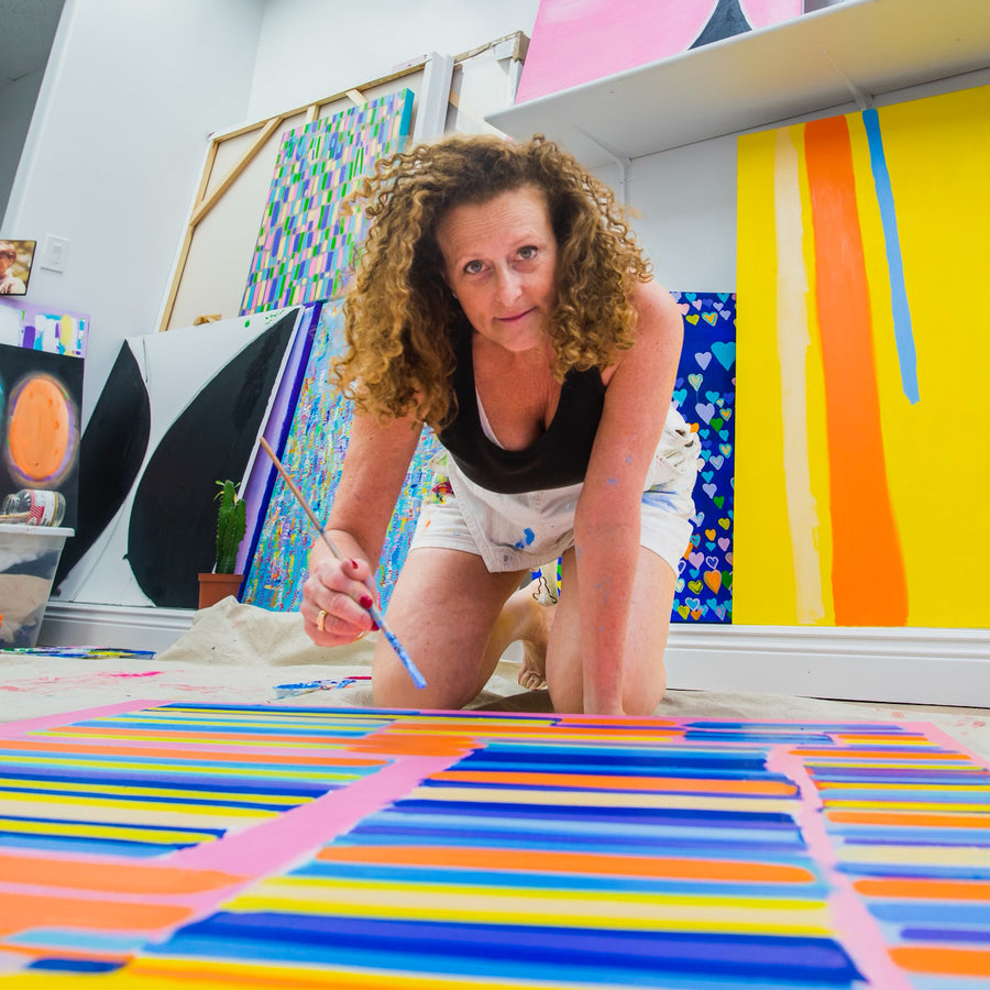 Bonnie Druker painting in her studio